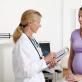 Болит копчик во время беременности: вариант нормы или признак серьезной болезни?